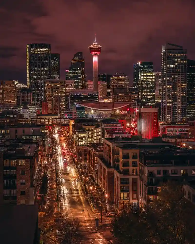 Calgary Tower and downtown skyline illuminated at night